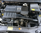 Mazda 3 1.6 77kW s italskám zažízrním BRC a nádrží místo rezervy.